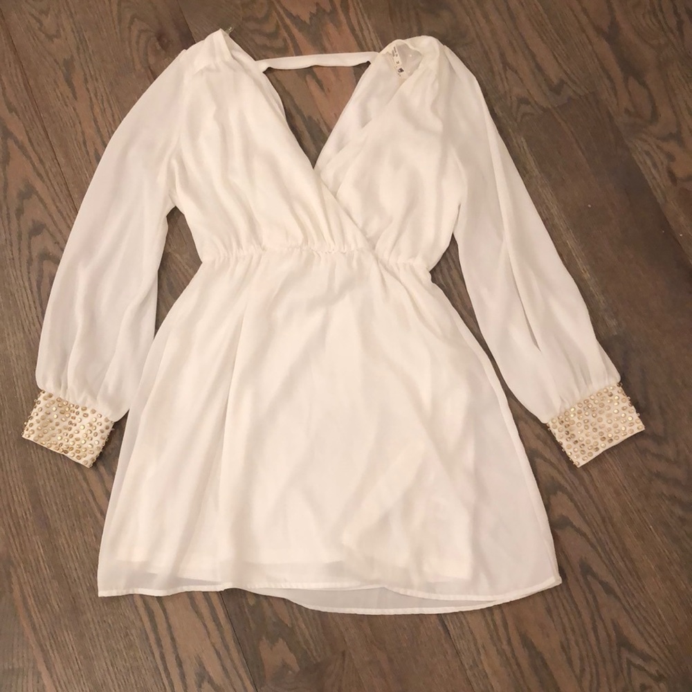 White and gold sleeved dress